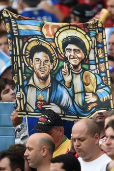 Messi e Maradona, i santi d'Argentina. Afp